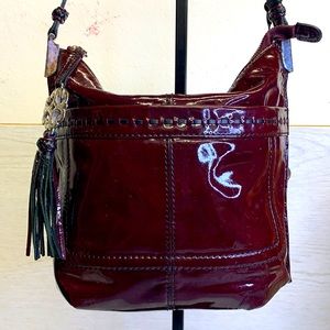 Brighton maroon patent leather shoulder bag with black contrasting leather.